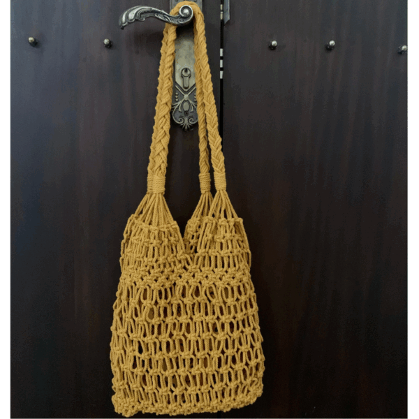 Sac à main macramé fait main- porté épaule, doublure lin imprimé tropical, couleur jaune safran. Modèle bohème chic, artisanal, en coton. Pièce unique